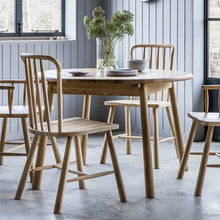 Load image into Gallery viewer, Murphy 4-6 Seater Extendable Round Oak Dining Table in Natural

